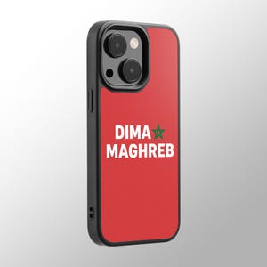 May include: A black smartphone case featuring a solid red background with the white text DIMA MAGHREB and a small green five-pointed star. The case has a black camera cutout area with two circular lenses and a flash, designed for a mobile device.