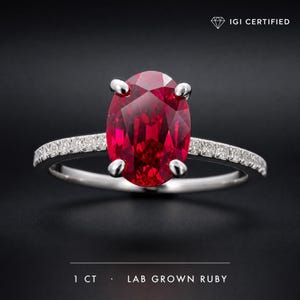 Bague de fiançailles rubis ovale cultivé en laboratoire de 1 carat, anneau halo caché en or 14 carats pavé