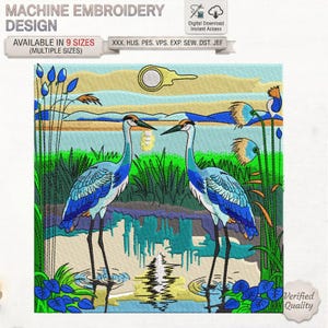 May include: A machine embroidery design featuring two blue and white herons standing in a marshy landscape with tall green reeds, blue water, and a yellow sun. The text reads MACHINE EMBROIDERY DESIGN, AVAILABLE IN 9 SIZES, and XXX, HUS, PES, VPS, EXP, SEW, DST, JEF.