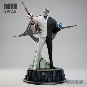May include: A Two-Face statue, split down the middle with a white and black suit, holding a Tommy gun. The statue stands on a base with a cityscape and stacks of money. The text "RATH SPACE" is at the top left.