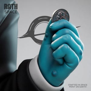 May include: A close-up of a teal hand holding a silver coin. The coin has a detailed design. The image includes the text "RATH SPACE" and "CRAFTED IN SPACE PRINT ON EARTH" on a gray background.