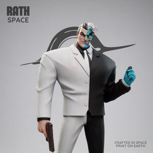 May include: A Two-Face figure, a DC Comics villain, stands in a split black and white suit, holding a gun and a coin. The figure has a two-toned face, with one side normal and the other scarred. The figure is a collectible item.