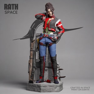 May include: A collectible figurine of a character wearing a red and black jacket, green top, and blue pants with a harness. The figure stands on a stone-like base next to a tall rifle. Text reads RATH SPACE and CRAFTED IN SPACE PRINT ON EARTH.