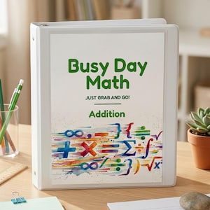 Pode incluir: Uma pasta de três argolas branca com uma capa intitulada Busy Day Math, JUST GRAB AND GO!, e Addition em texto verde. A parte inferior apresenta um design abstrato de aguarela colorido com vários símbolos e operadores matemáticos.