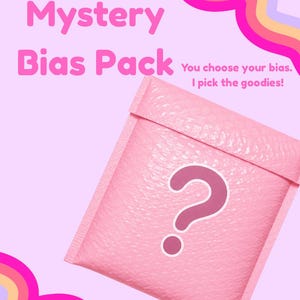 May include: A pink bubble mailer with a dark pink question mark symbol on the front. The text reads Mystery Bias Pack and You choose your bias. I pick the goodies! The background is light pink with colourful wavy lines in the corners.