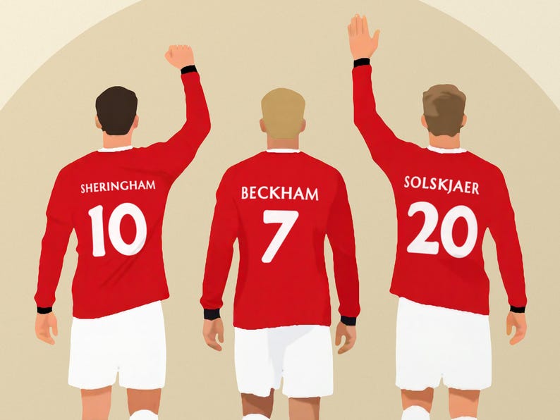 Close crop of the three red shirts from behind, white surnames above the numbers 10, 7 and 20.