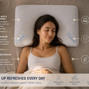 May include: A white rectangular pillow with a Tencel cover featuring perforated side panels. The pillow is labeled with the text Tencel and includes informational graphics detailing features like neck support, pressure relief, and breathability.