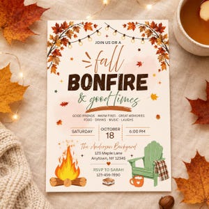May include: A rectangular invitation card featuring autumn maple leaves, string lights, a bonfire illustration, and a green Adirondack chair. Text includes: JOIN US OR A fall BONFIRE & good times, GOOD FRIENDS, WARM FIRES, GREAT MEMORIES, FOOD, DRINKS, MUSIC, LAUGHS, SATURDAY OCTOBER 18 6:00 PM, The Anderson Backyard, 123 Maple Lane, Anytown, NY 12345, RSVP TO SARAH 123-456-7890.