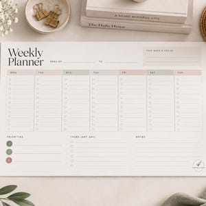 May include: A white weekly planner sheet with black text and pastel-coloured headers for each day of the week. The layout includes sections for a weekly focus, daily task lists with checkboxes, a priorities section with coloured dots, and notes.