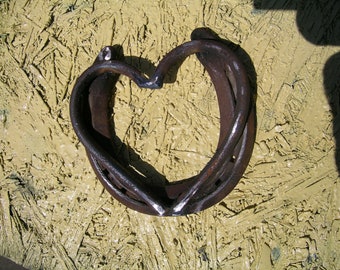 horseshoe with metal heart welded to it.  14.99