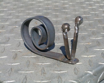 Hand made snail from flat bar & round stock approx. 6x6  can be made bigger if you like