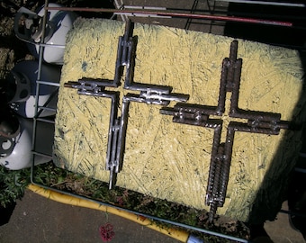 metal cross approx. 9" wide 12" tall 3/8 round stock size can be made to order