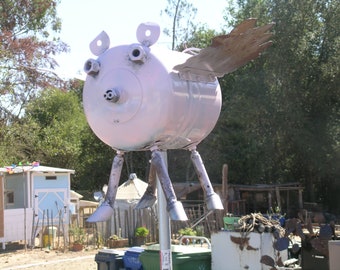 Hand made flying pig made from recycled water filter bottle approx. 18x14x8