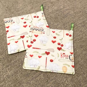 Juego de dos (2) agarraderas para hornear crema, con presillas, personalizables.