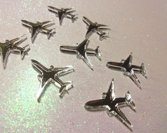 airplanes,laser cut,laser cut planes,silver jets,jets,airplane charms,
