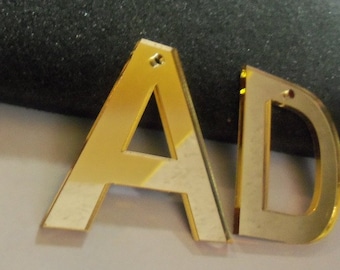 letras cortadas con láser, letras iniciales, letras snapback, letras