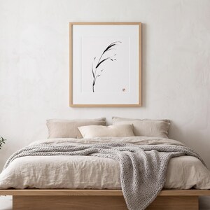 Minimalist Sumi-e Bent Reed print featuring Japanese ink brushwork of a graceful reed bending softly on warm white paper.