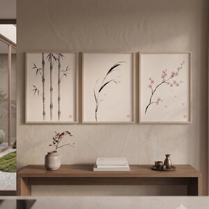 Three Bamboo three ink bamboo stalks print styled in a calm Japandi room — warm off-white. Calm & Oak.