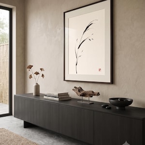 Minimalist Sumi-e Bent Reed print featuring Japanese ink brushwork of a graceful reed bending softly on warm white paper.