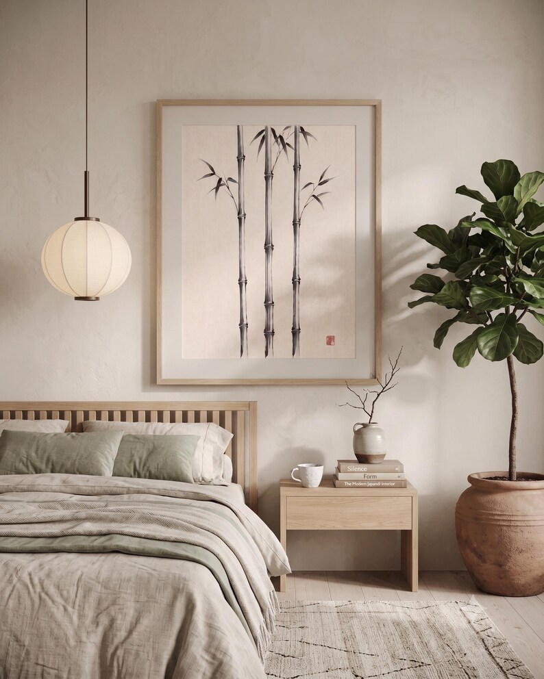 Three Bamboo three ink bamboo stalks print styled in a calm Japandi room — warm off-white. Calm & Oak.