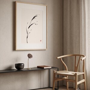 Minimalist Sumi-e Bent Reed print featuring Japanese ink brushwork of a graceful reed bending softly on warm white paper.
