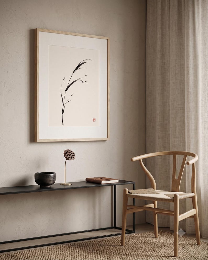 Minimalist Sumi-e Bent Reed print featuring Japanese ink brushwork of a graceful reed bending softly on warm white paper.