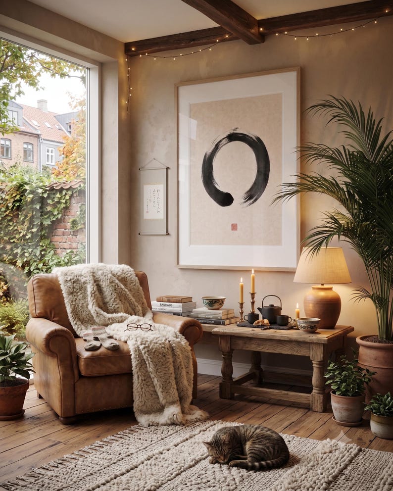 Framed Sumi Enso print displayed above a modern console table in a Japandi-inspired living room with neutral decor.
