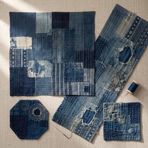 Japanese Boro Indigo wall art featuring layered textile-inspired patterns in deep blue tones with a wabi-sabi aesthetic.