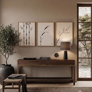 Japanese Sumi-e botanical print set featuring Bamboo, Cherry Blossom, and Bent Reed arranged as a minimalist Zen triptych.