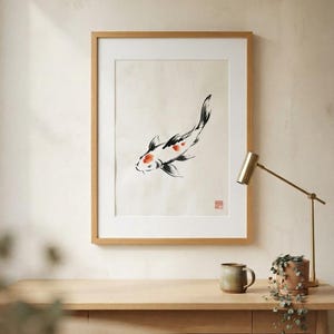 Koi ink koi fish with vermillion accent print styled in a calm Japandi room — warm off-white. Calm & Oak.