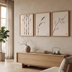 Three Bamboo three ink bamboo stalks print styled in a calm Japandi room — warm off-white. Calm & Oak.