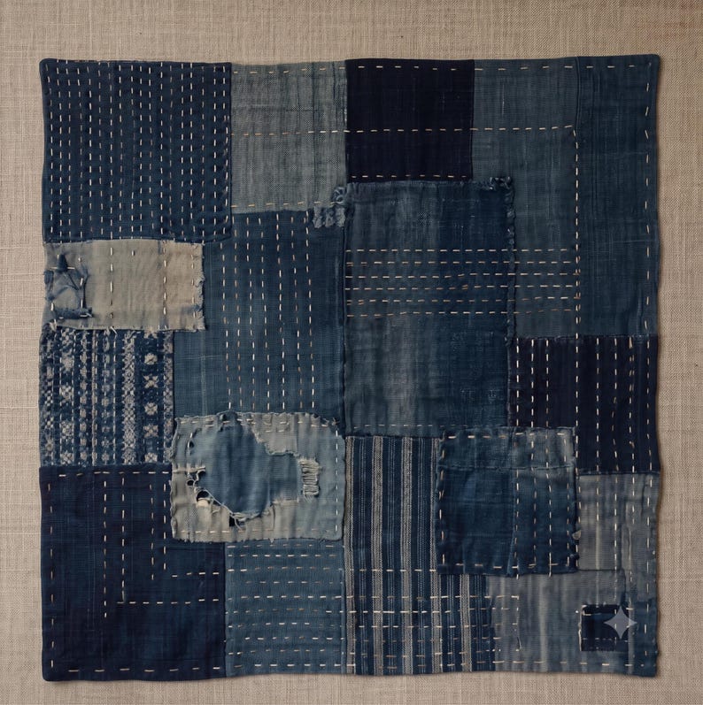 Japanese Boro Indigo wall art featuring layered textile-inspired patterns in deep blue tones with a wabi-sabi aesthetic.