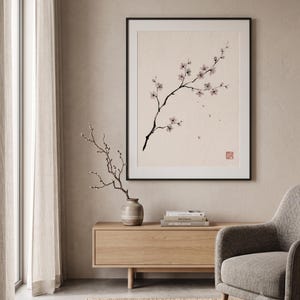 Cherry Branch sakura branch in ink print styled in a calm Japandi room — soft pink and cream. Calm & Oak.