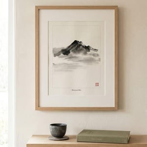 Mountain Mist misty sumi-e peaks print styled in a calm Japandi room — soft grey. Calm & Oak.