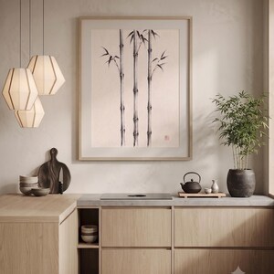 Three Bamboo three ink bamboo stalks print styled in a calm Japandi room — warm off-white. Calm & Oak.