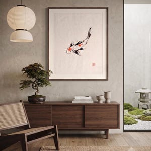 Koi ink koi fish with vermillion accent print styled in a calm Japandi room — warm off-white. Calm & Oak.