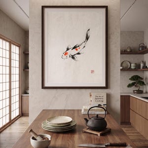 Koi ink koi fish with vermillion accent print styled in a calm Japandi room — warm off-white. Calm & Oak.