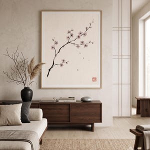 Cherry Branch sakura branch in ink print styled in a calm Japandi room — soft pink and cream. Calm & Oak.