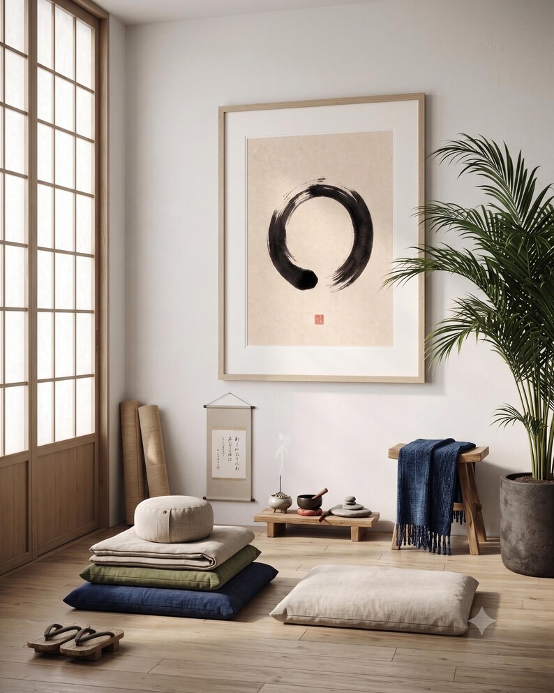 Framed Sumi Enso print displayed above a modern console table in a Japandi-inspired living room with neutral decor.
