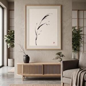 Minimalist Sumi-e Bent Reed print featuring Japanese ink brushwork of a graceful reed bending softly on warm white paper.