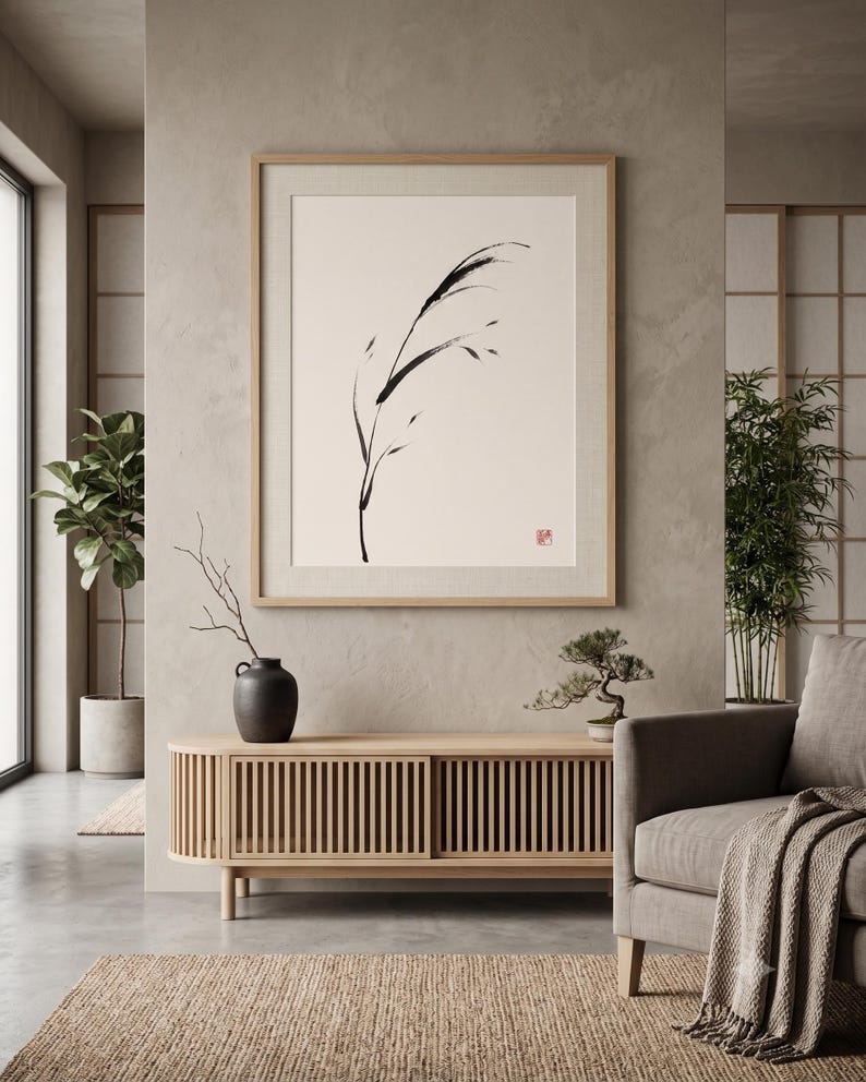 Minimalist Sumi-e Bent Reed print featuring Japanese ink brushwork of a graceful reed bending softly on warm white paper.