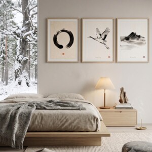 Framed Sumi Enso print displayed above a modern console table in a Japandi-inspired living room with neutral decor.