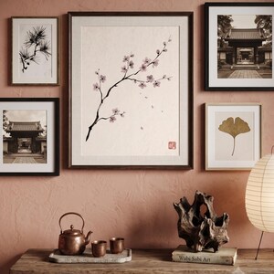 Cherry Branch sakura branch in ink print styled in a calm Japandi room — soft pink and cream. Calm & Oak.