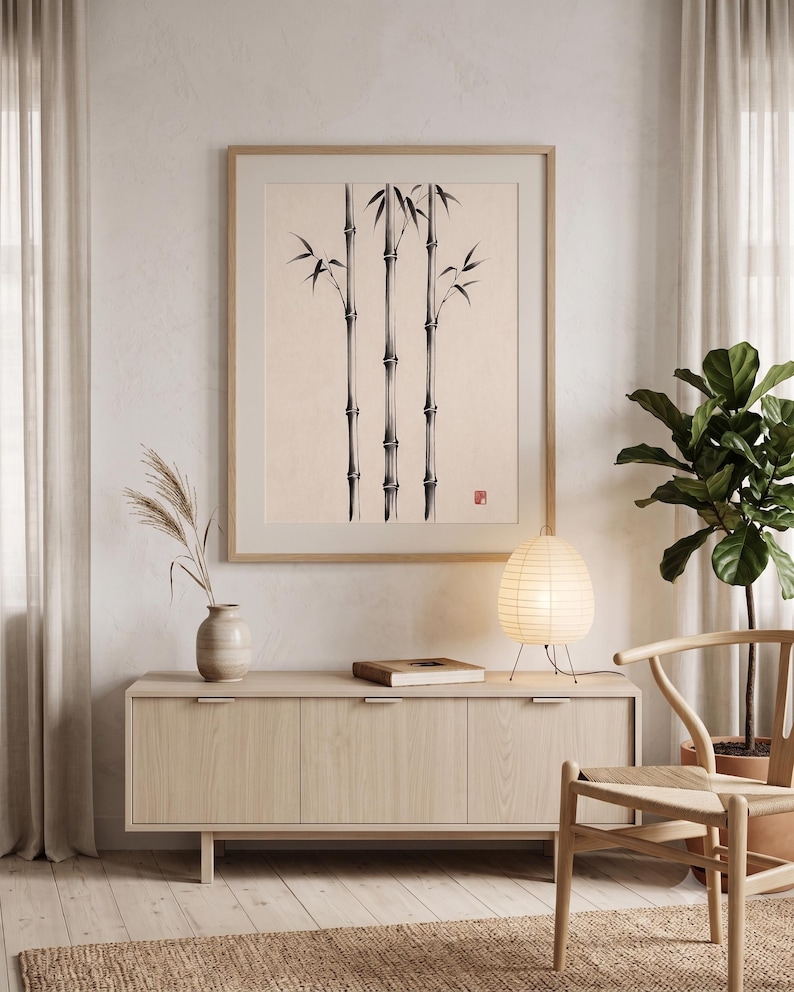 Three Bamboo three ink bamboo stalks print styled in a calm Japandi room — warm off-white. Calm & Oak.