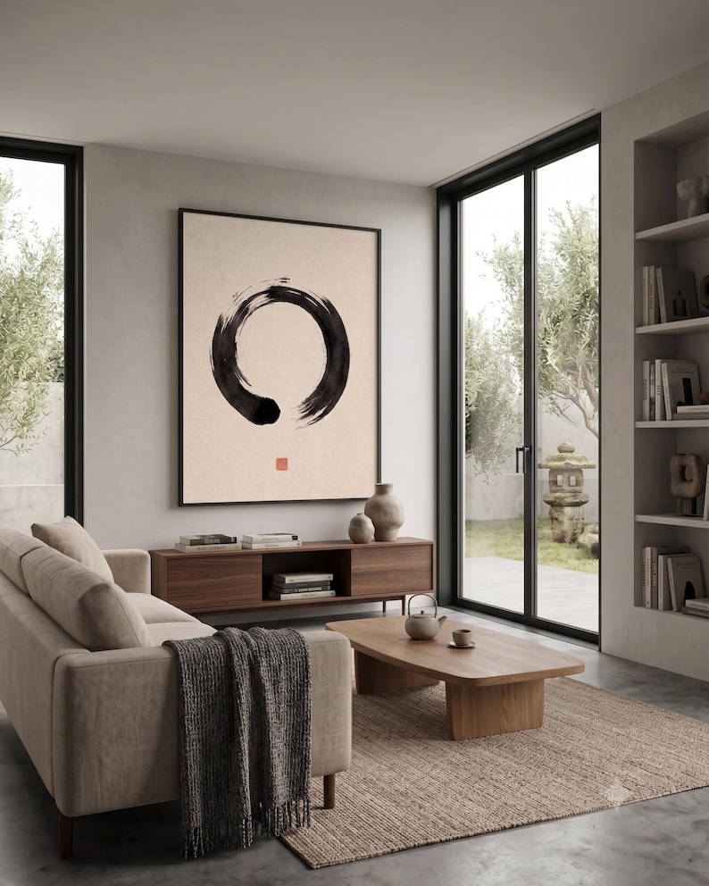 Framed Sumi Enso print displayed above a modern console table in a Japandi-inspired living room with neutral decor.