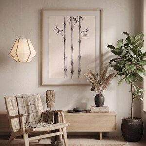 Three Bamboo three ink bamboo stalks print styled in a calm Japandi room — warm off-white. Calm & Oak.