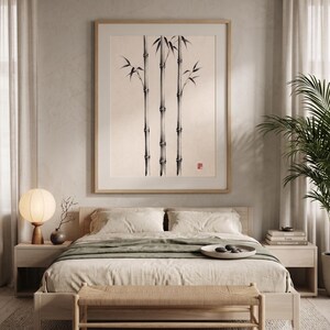 Three Bamboo three ink bamboo stalks print styled in a calm Japandi room — warm off-white. Calm & Oak.