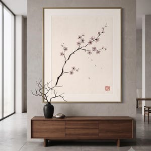 Cherry Branch sakura branch in ink print styled in a calm Japandi room — soft pink and cream. Calm & Oak.