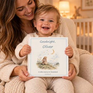 Personalised baby book – mother and smiling baby holding a custom name bedtime story book, a new baby gift and baby shower keepsake