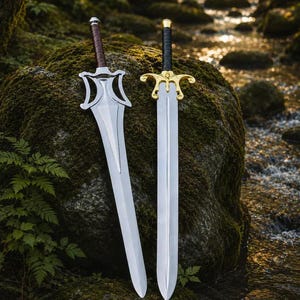 May include: Two metal swords with pointed blades. The left sword features a silver crossguard and a brown wrapped handle. The right sword has a gold-colored ornate crossguard with a central emblem and a black wrapped handle with a gold pommel.